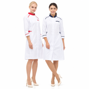 Two models in white medical coats with navy and red trim, white background