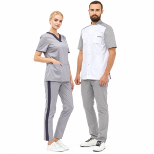 Grey women’s scrub set and white men’s medical tunic with grey sleeves, white background